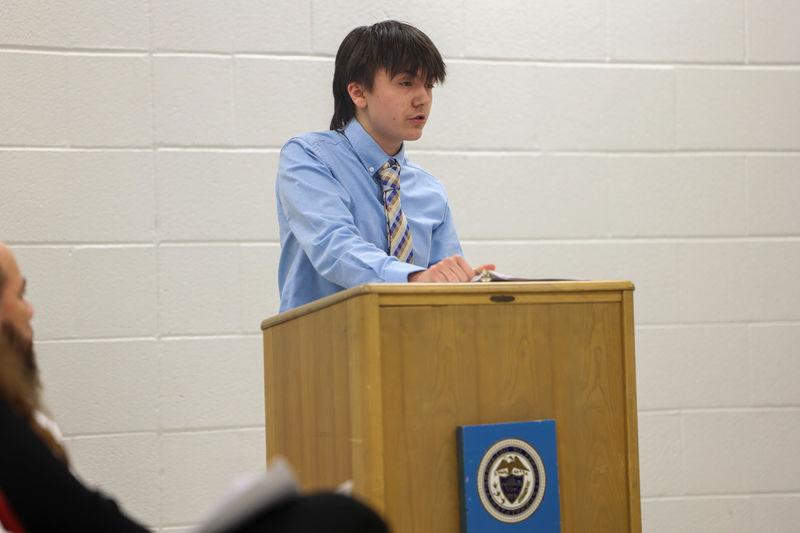 Ryan speaking at podium